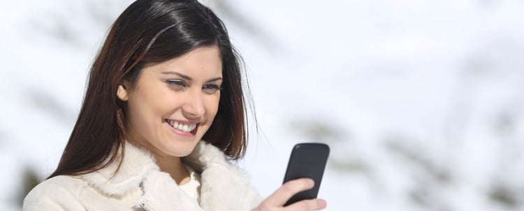 woman-smiling-at-phone.jpg